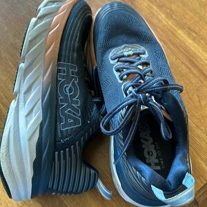 HOKA One navy blue and pink Bondi 6 athletic shoes